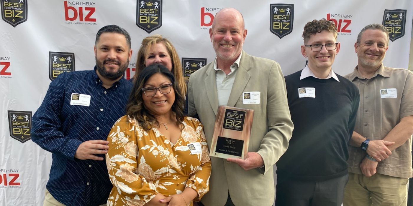 North Bay Credit Union team with award plaque in hand