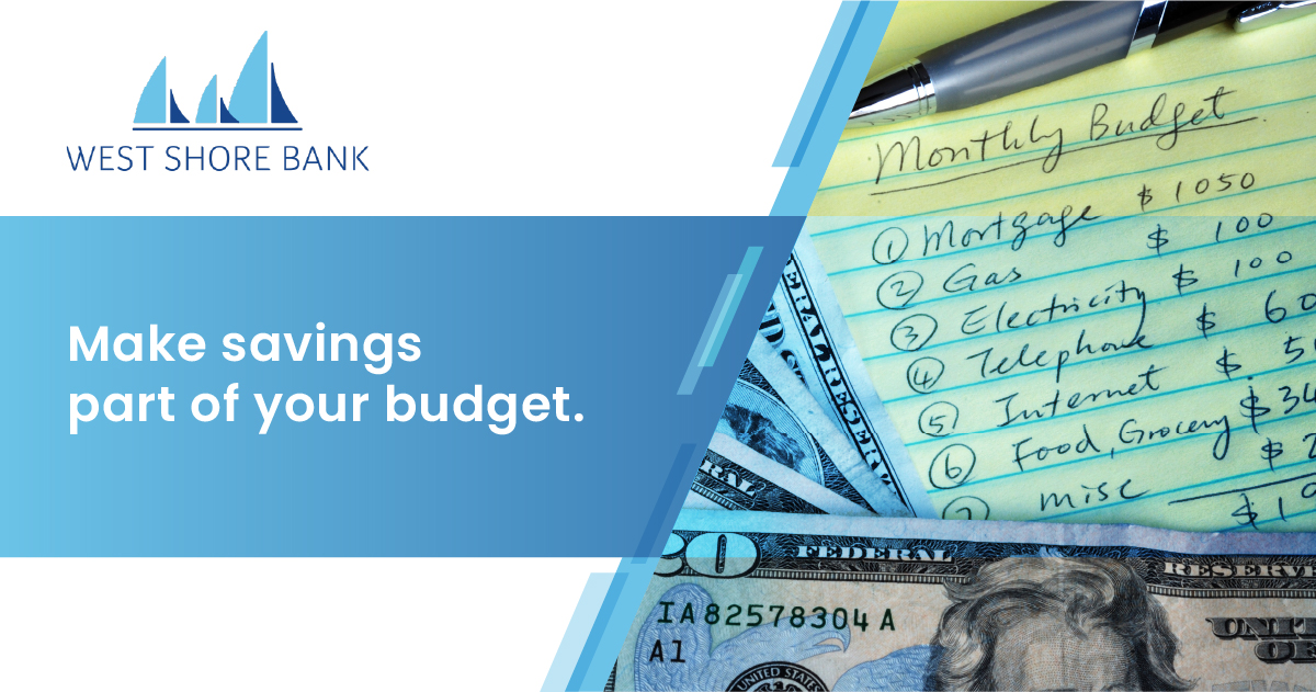 Make savings part of your budget - Paper with a monthly budget surrounded by cash