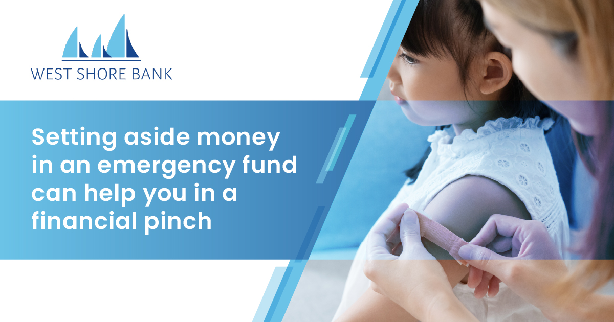 Setting aside money in an emergency fund can help you in a financial pinch - Mom putting band aid on her daughter