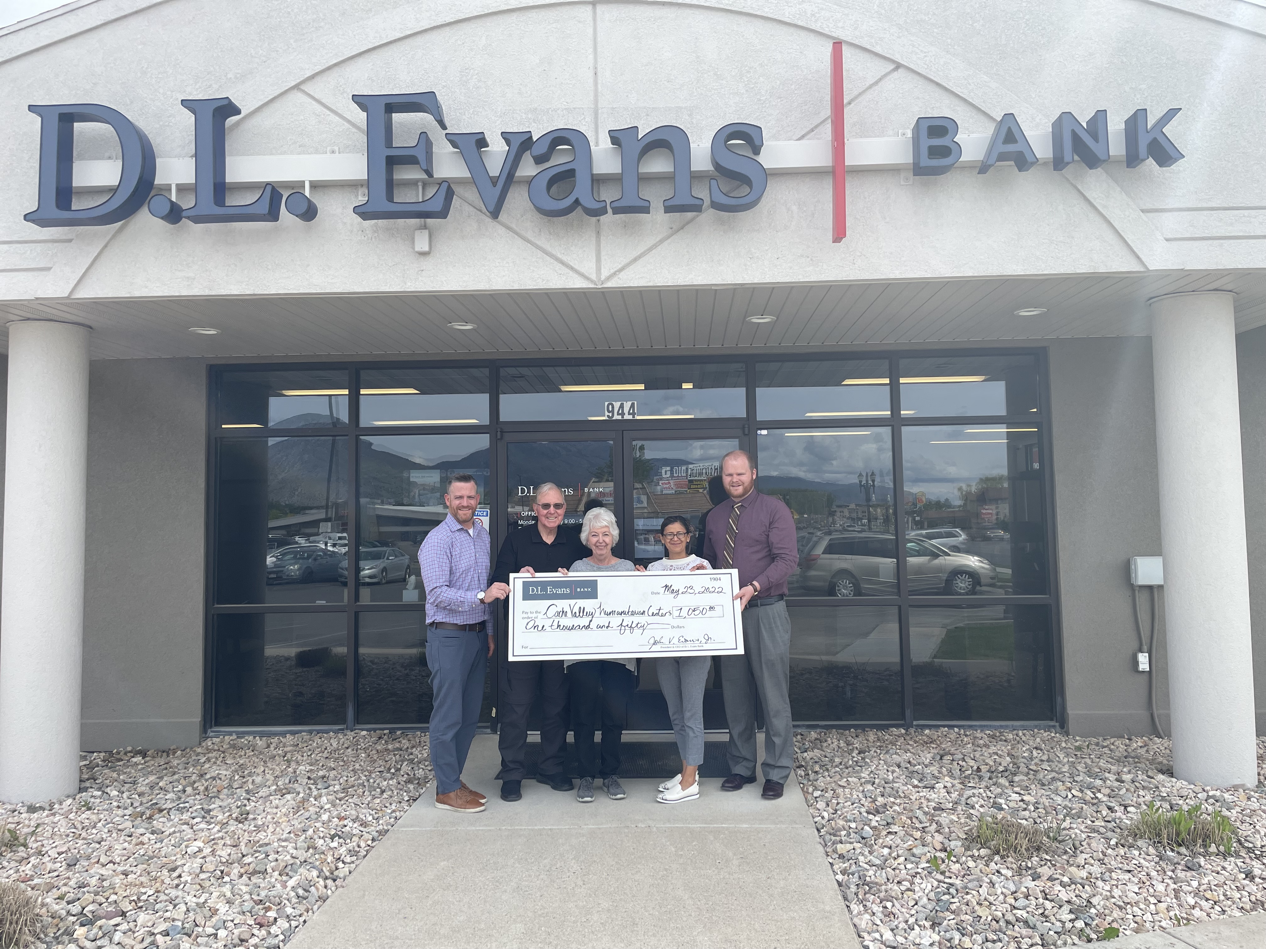 Check presentation to Cache Valley Humanitarian Center by Logan branch employees. 