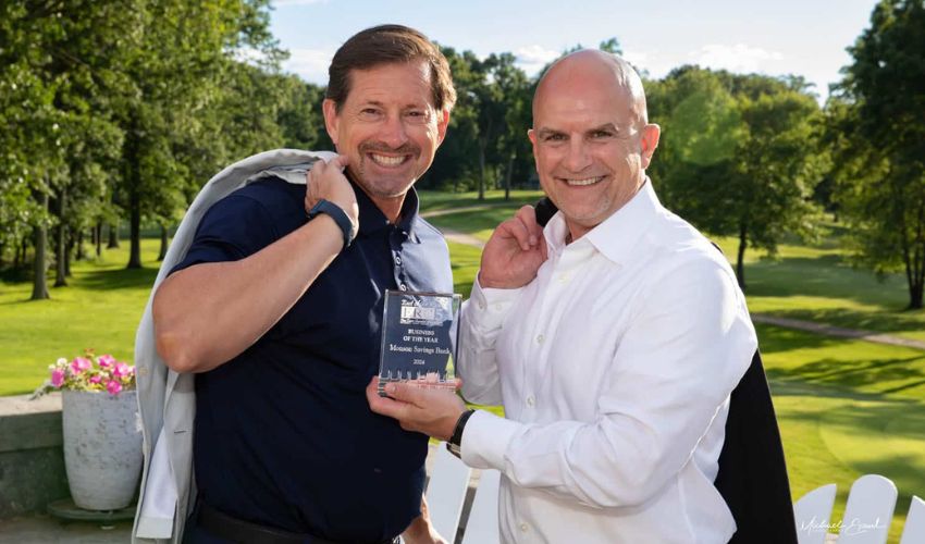 Dan Moriarty, Monson Savings Bank President & CEO (right), and Michael Rouette, Monson Savings Bank Executive Vice President and COO, shown with the ERC5 Business of the Year award. (Photo Credit: Michael Epaul)