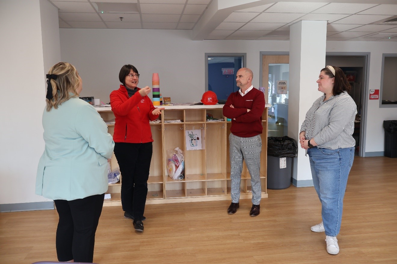 Suzanne Parker, Girls Inc. of the Valley Executive Director (center left), and Jessica Colson, Girls Inc. of the Valley Director of Development & Communications (right), gave a tour of their headquarters to Monson Savings Bank AVP Business Development Officer Kylie LaPlante and President & CEO Dan Moriarty.