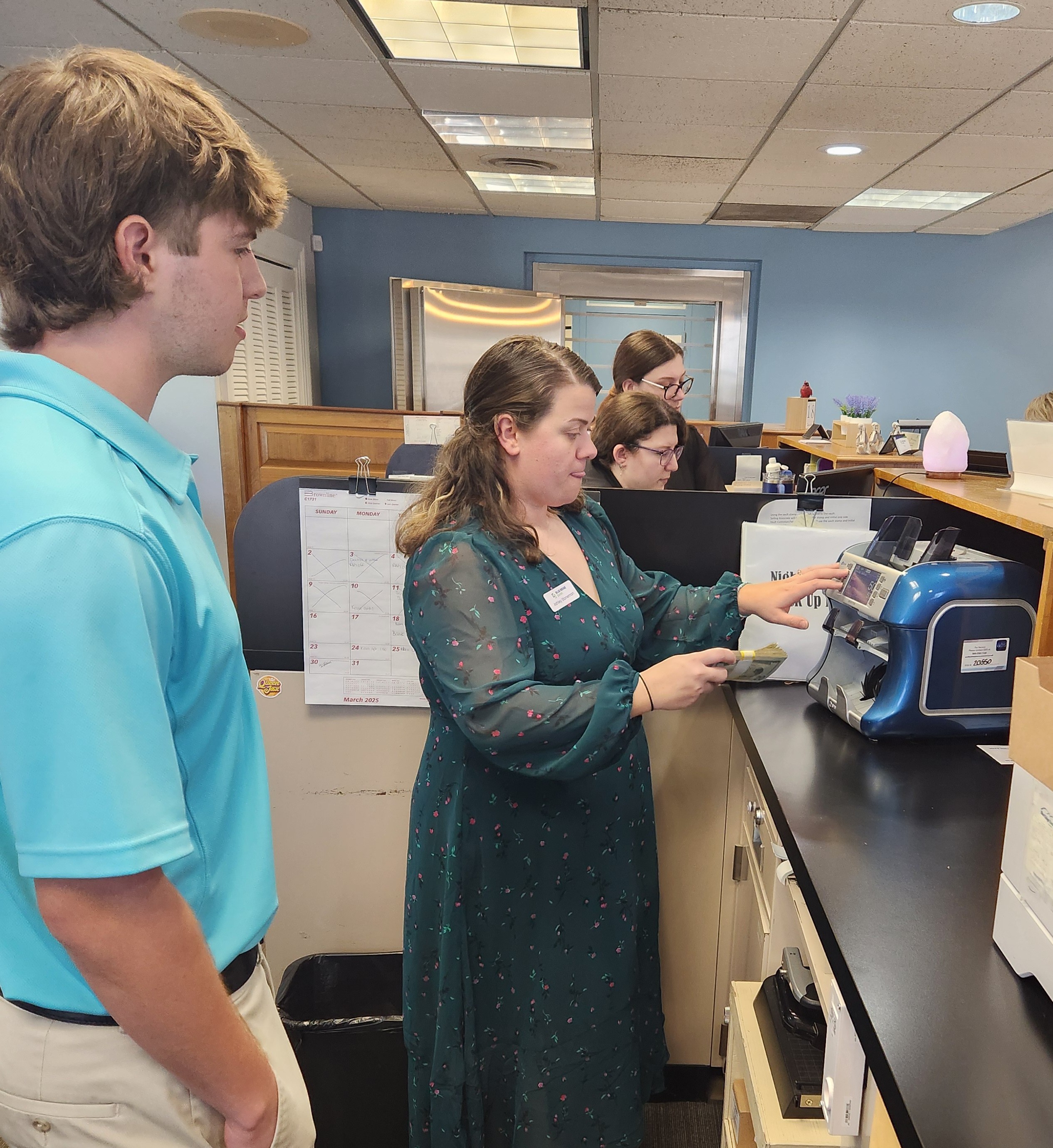 Students at VBA Bank Day in Mineral enjoyed seeing the cash counter machine in action.