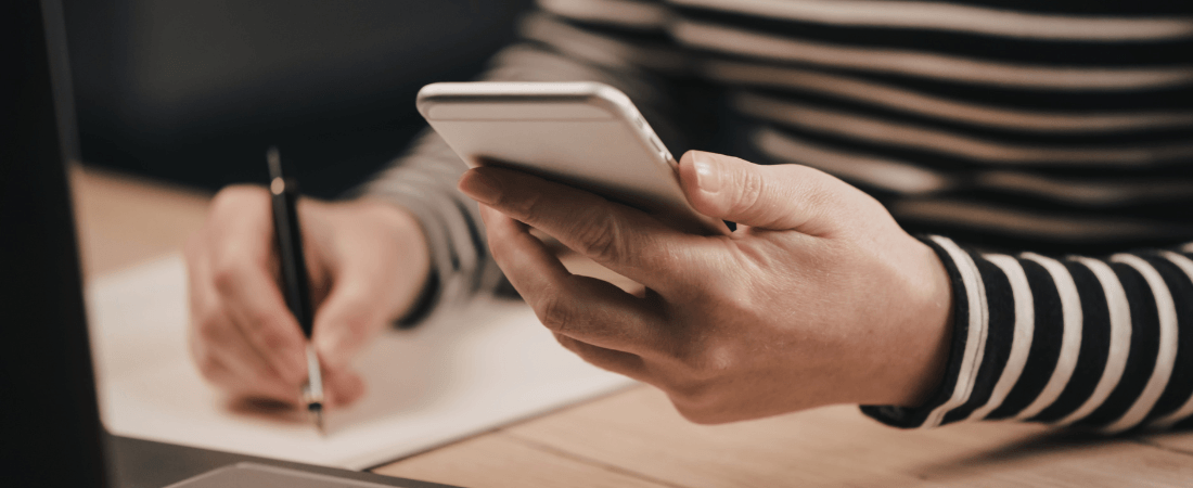 Woman writing down info