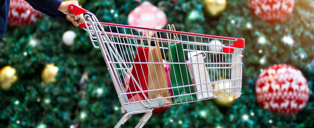 Shopping cart with presents in it