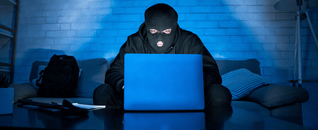Scammer at a laptop