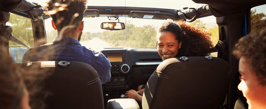 Happy family in a car
