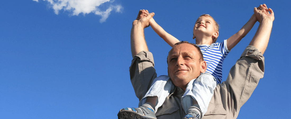 Man with kid on his shoulder