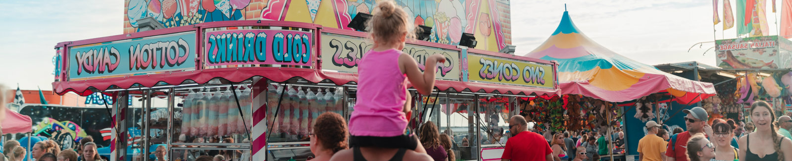 Little girl on dad's shoulders at Harborfest 2019 in Oswego, NY.
