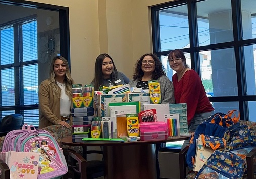 American Momentum Bank collects school supplies for local charity