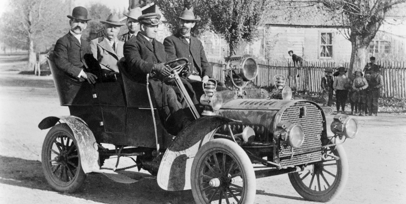 Back Row: D.L. Evans, J.N. Ireland, and R.J. Harding, Sr. Front Row: D.L. Evans, Jr. and L.L. Evans pictured in model T-Ford car.