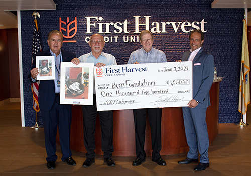 First Harvest Credit Union donates to Burn Foundation