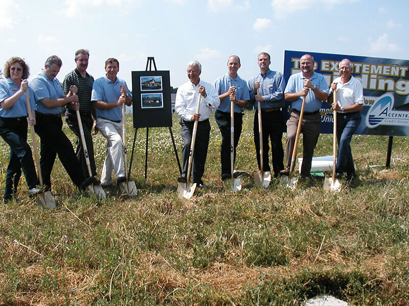 The 2005 groundbreaking for the Albert Lea branch of Accentra Credit Union. Shown here are Darlene Thaisen, Mike Case, Kim Schroeder, David Kubat, Lon Krueger, David Raffelson, Aaron DeJong, Gordy Kuehne and John Gray.