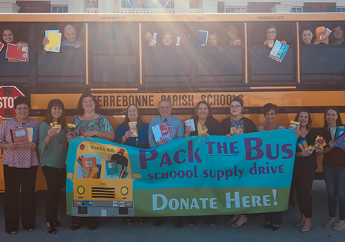 Help United Way & Synergy Bank Pack The Bus!