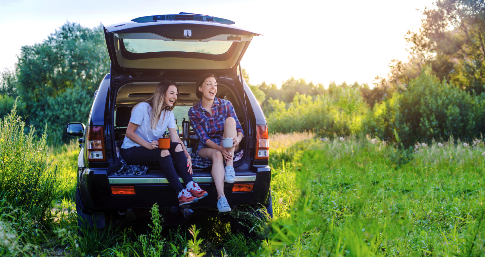 Consumers enjoying their new car which they got with a D.L. Evans car or vehicle loan.