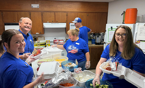 Serving Smiles at the Kids Summer Café