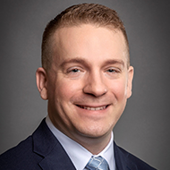 Portrait of team member, Derrick Reed