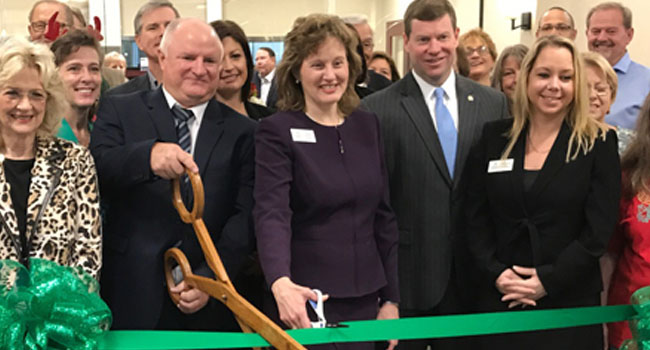 Thanks to the Wakulla County Chamber of Commerce for helping us welcome friends to our newly-completed building and home of Prime Meridian Bank Crawfordville. Bank CEO Sammie D. Dixon, Jr. (right) was on hand to join Wakulla Market President Lew Moore (left with scissors), Prime Meridian Bank Executive Vice President Susan Payne Turner, and Branch Manager Michelle Lawhon (far right) as they cut the green ribbon.