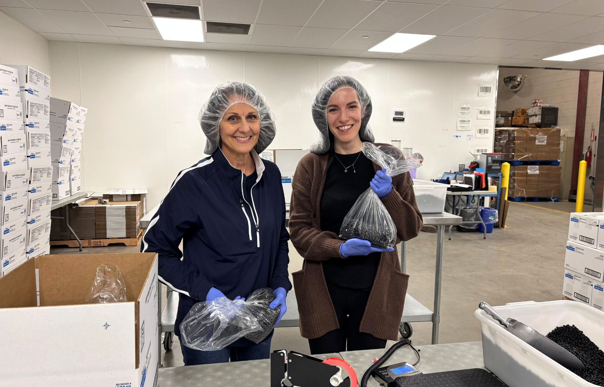  D.L Evans Bank employees volunteering at the Idaho Food Bank in Boise, ID.  