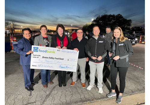 American Momentum Bank contributes $5,000 to KBTX's Food for Families Food Drive